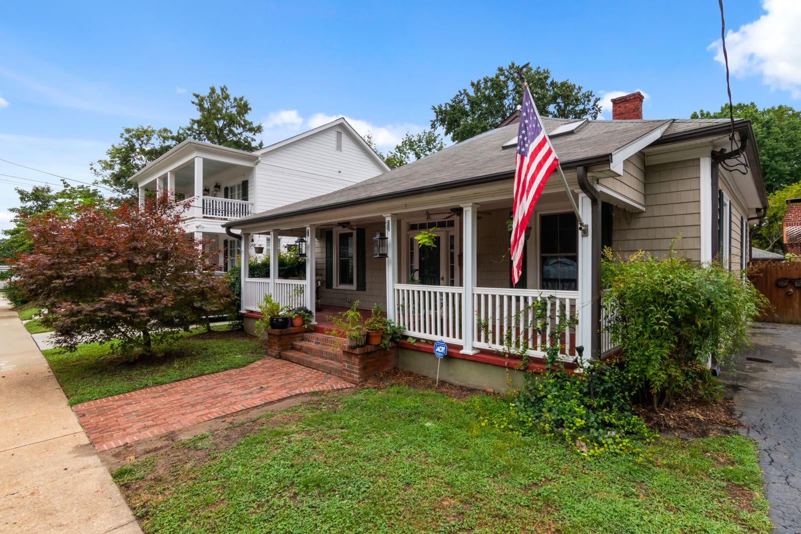 Historic bungalow with a front porch and garden